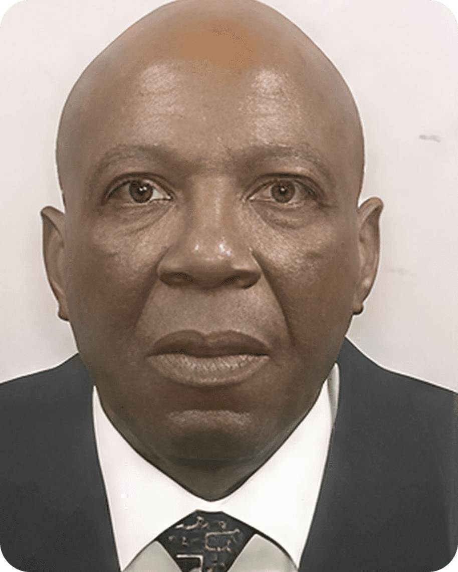 Man in formal attire, neutral expression